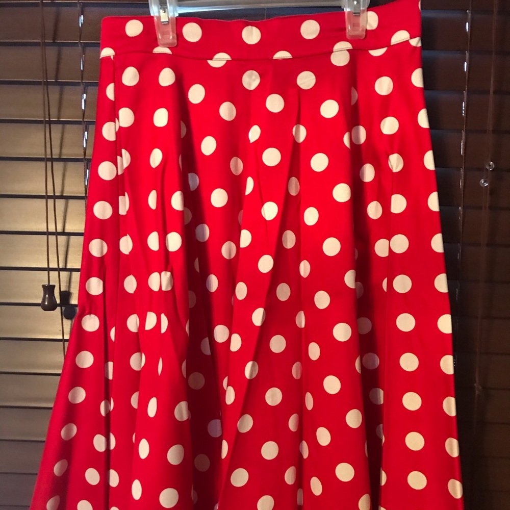 Rock Steady white and red polka dot circle skirt.